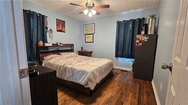 112 Hilltop Dr, Newborn, GA 30056 - bedroom with baseboards, dark wood-style floors, and ceiling fan