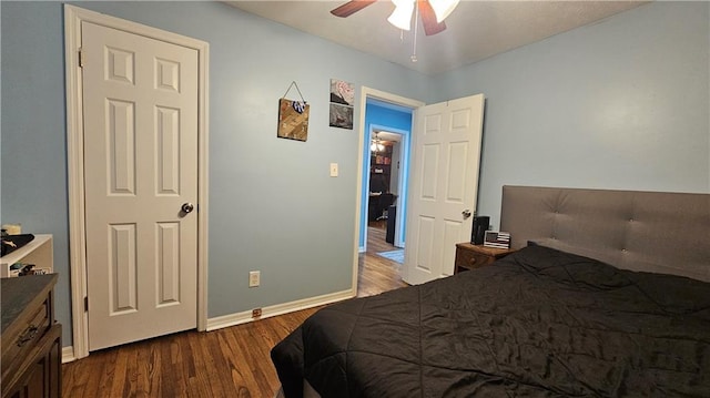 112 Hilltop Dr, Newborn, GA 30056 - bedroom featuring wood finished floors, baseboards, and ceiling fan
