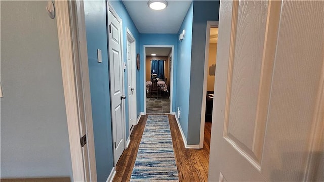 112 Hilltop Dr, Newborn, GA 30056 - hall featuring dark wood-type flooring and baseboards