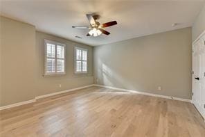 1668 Sabastian Pt NE, Atlanta, GA 30329 - spare room with baseboards, ceiling fan, and wood finished floors