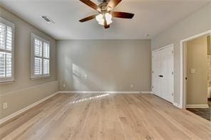 1668 Sabastian Pt NE, Atlanta, GA 30329 - unfurnished bedroom featuring ceiling fan, baseboards, visible vents, and wood finished floors