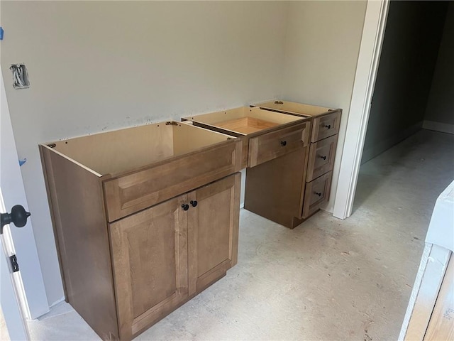 interior space featuring concrete flooring