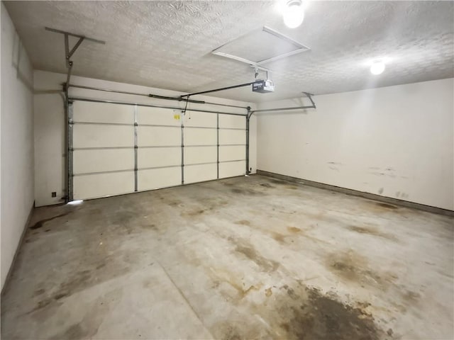 parking garage featuring a garage door opener