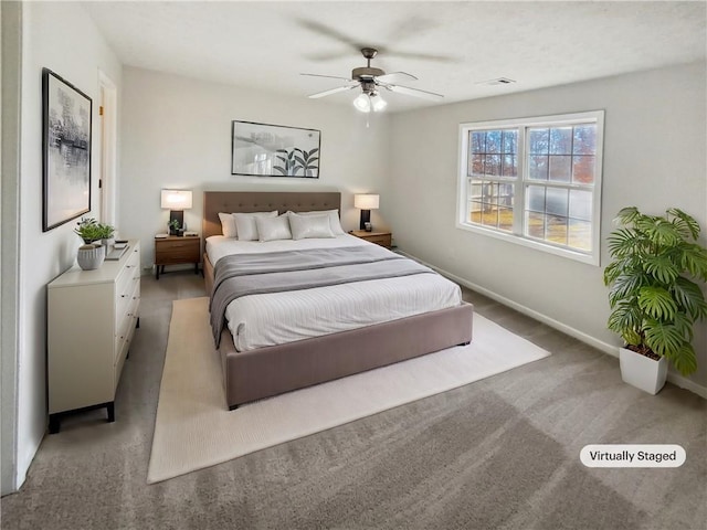 bedroom featuring light carpet, visible vents, baseboards, and a ceiling fan