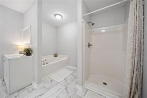 440 Colbert Rd, Dallas, GA 30132 - bathroom featuring a bath, a shower with curtain, and baseboards