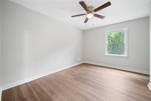 440 Colbert Rd, Dallas, GA 30132 - unfurnished room featuring wood finished floors, baseboards, and a ceiling fan