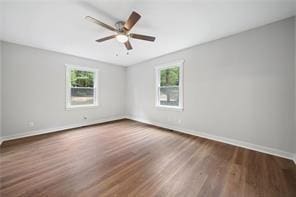 440 Colbert Rd, Dallas, GA 30132 - spare room featuring plenty of natural light, wood finished floors, a ceiling fan, and baseboards