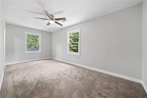 440 Colbert Rd, Dallas, GA 30132 - carpeted empty room with healthy amount of natural light, baseboards, and ceiling fan