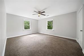 440 Colbert Rd, Dallas, GA 30132 - unfurnished room featuring ceiling fan, baseboards, and carpet
