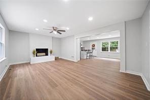 440 Colbert Rd, Dallas, GA 30132 - unfurnished living room featuring wood finished floors, ceiling fan, recessed lighting, and baseboards