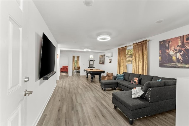 living area with billiards, baseboards, and light wood-style flooring