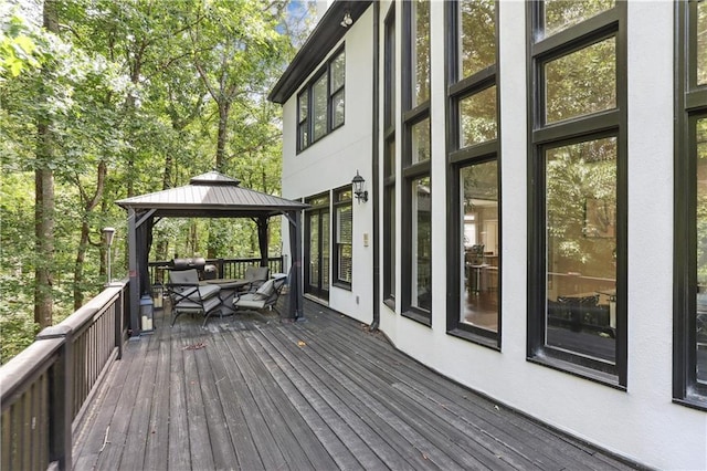 wooden terrace with a gazebo