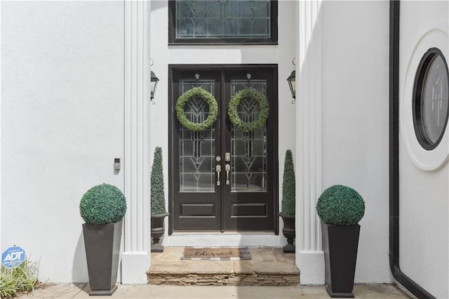 property entrance featuring french doors