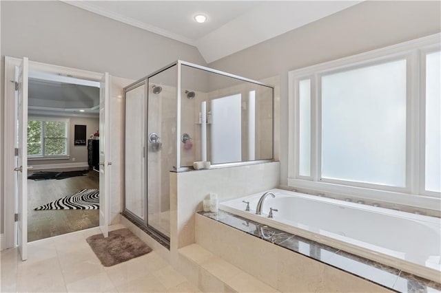 bathroom featuring lofted ceiling, ornamental molding, shower with separate bathtub, and hardwood / wood-style flooring