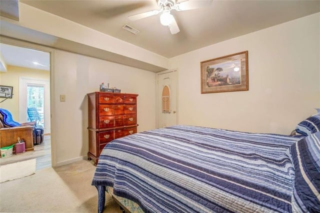 bedroom featuring ceiling fan and carpet flooring