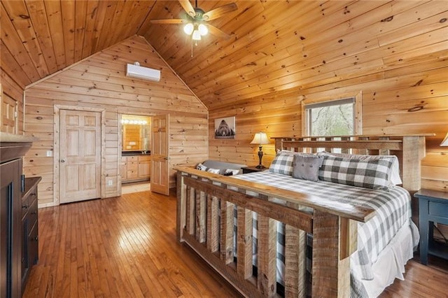 bedroom with light wood-type flooring, wood walls, high vaulted ceiling, ceiling fan, and wooden ceiling