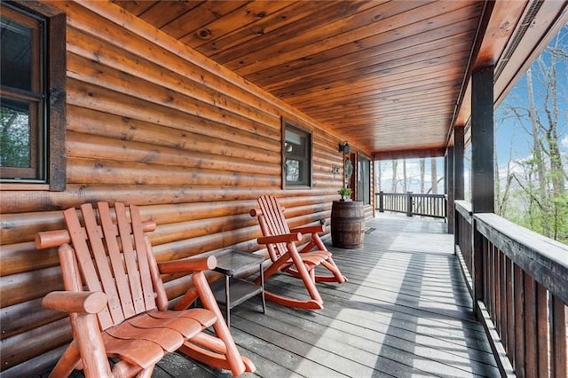 wooden terrace featuring a porch