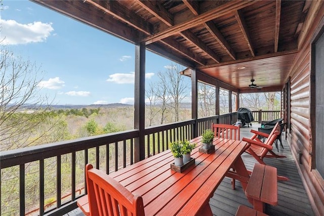 wooden deck with ceiling fan