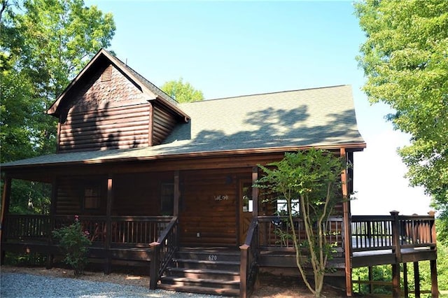 log home with a porch