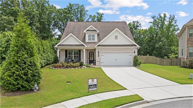 3392 Fall Branch Ln, Buford, GA 30519 - view of front of property featuring brick siding, concrete driveway, an attached garage, and a porch