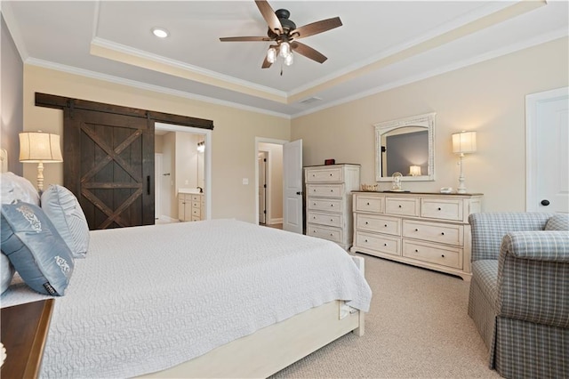 3392 Fall Branch Ln, Buford, GA 30519 - bedroom featuring a tray ceiling, ornamental molding, a barn door, light colored carpet, and ensuite bath