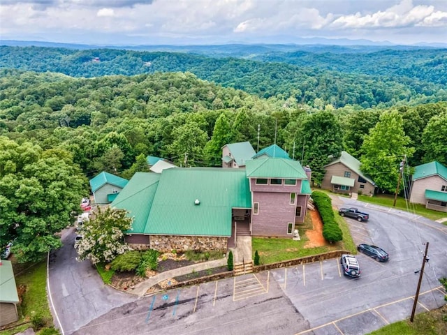 drone / aerial view with a view of trees