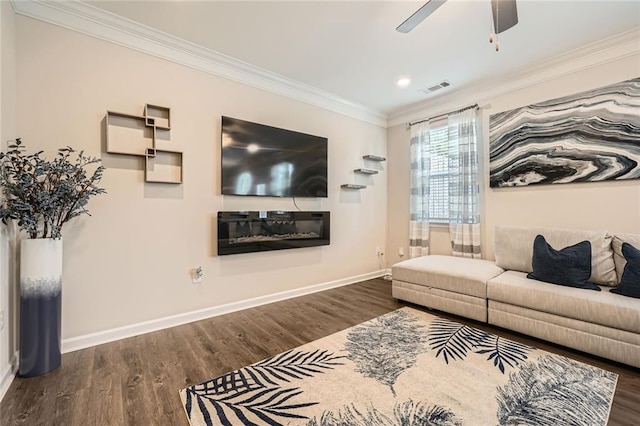 3070 Fareed St, Douglasville, GA 30135 - living room featuring crown molding, wood finished floors, baseboards, ceiling fan, and recessed lighting
