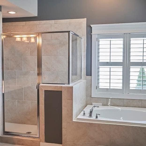 bathroom featuring plus walk in shower