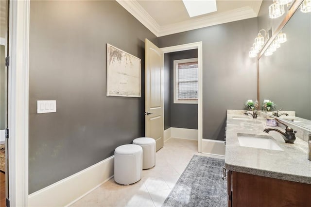 bathroom featuring ornamental molding, tile patterned flooring, and vanity