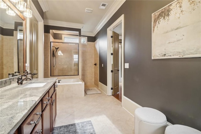 bathroom featuring tile patterned flooring, vanity, and ornamental molding