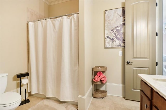 bathroom featuring tile patterned flooring, vanity, walk in shower, and toilet