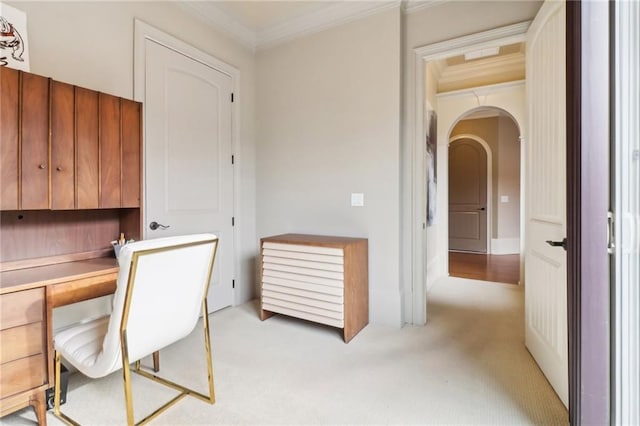 carpeted home office with ornamental molding