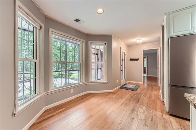 245 Sutallee Ridge Ln NE, White, GA 30184 - entryway with ornamental molding, healthy amount of natural light, baseboards, light wood-style flooring, and recessed lighting