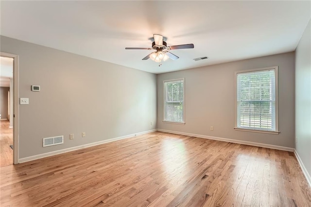 245 Sutallee Ridge Ln NE, White, GA 30184 - spare room featuring light wood-style floors, baseboards, and a ceiling fan