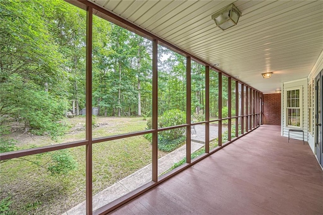 245 Sutallee Ridge Ln NE, White, GA 30184 - unfurnished sunroom featuring a view of trees