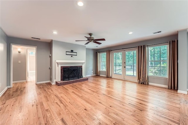 245 Sutallee Ridge Ln NE, White, GA 30184 - unfurnished living room with plenty of natural light, a ceiling fan, recessed lighting, baseboards, and light wood-type flooring