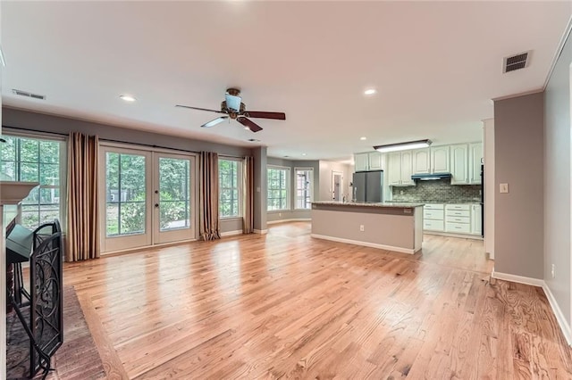 245 Sutallee Ridge Ln NE, White, GA 30184 - living room with a ceiling fan, light wood-type flooring, baseboards, recessed lighting, and a brick fireplace