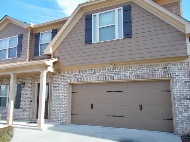 view of side of home with a garage