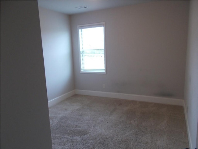 unfurnished room featuring carpet floors