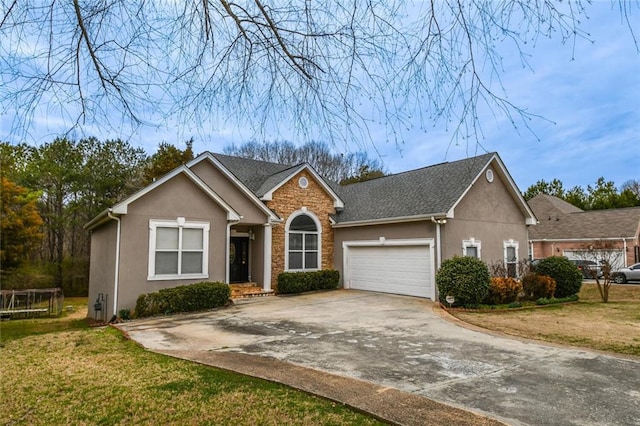 view of front facade with a garage, stone siding, driveway, stucco siding, and a front yard