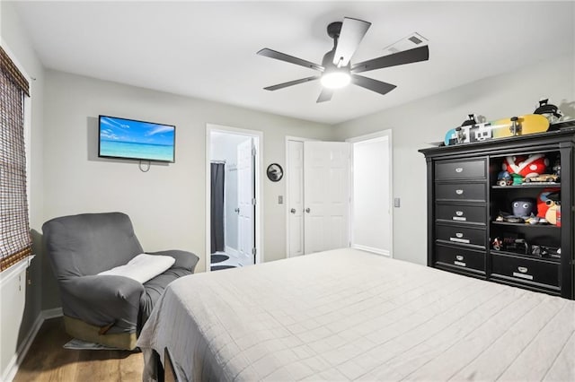 bedroom featuring connected bathroom, ceiling fan, and hardwood / wood-style flooring