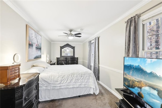 carpeted bedroom featuring ceiling fan and ornamental molding