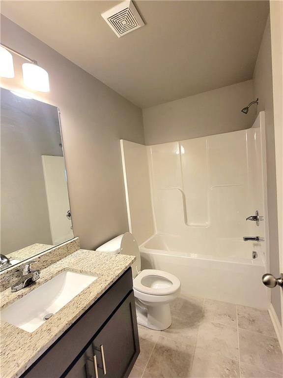 full bathroom with toilet, vanity, and bathing tub / shower combination