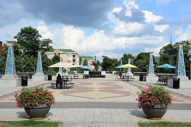 view of property's community with a patio