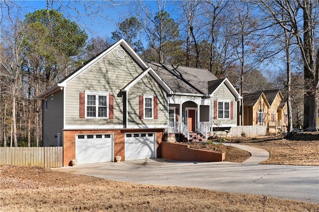 bi-level home with a porch and a garage