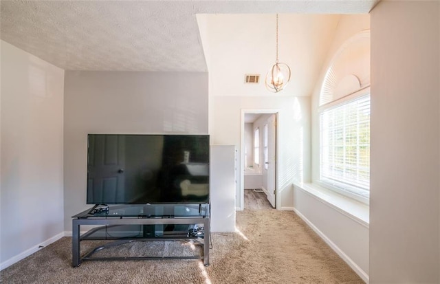 161 Honey Creek Rd, Mcdonough, GA 30252 - interior space featuring a chandelier, carpet floors, a textured ceiling, and baseboards