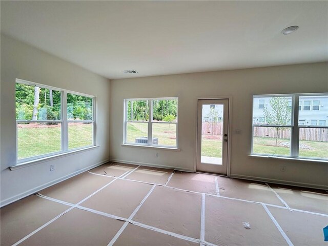 interior space featuring baseboards