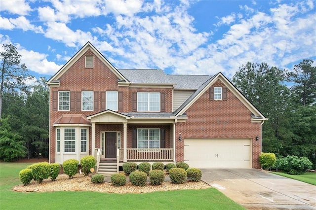 1709 Grove Ct SE, Conyers, GA 30013 - view of front of house featuring concrete driveway, covered porch, brick siding, and a garage