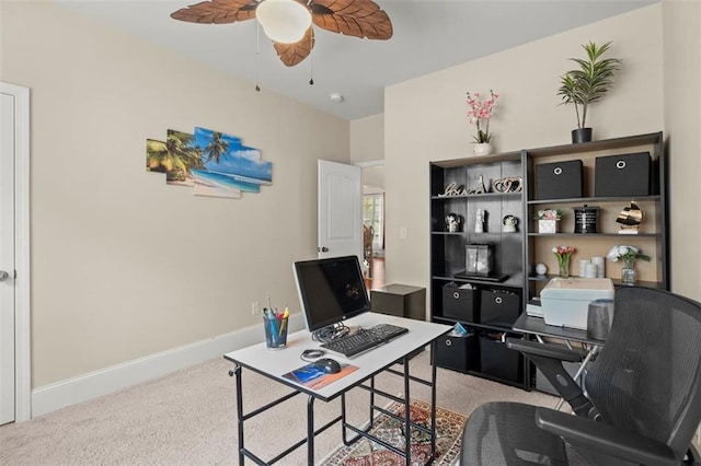 1709 Grove Ct SE, Conyers, GA 30013 - office area featuring light colored carpet, a ceiling fan, and baseboards