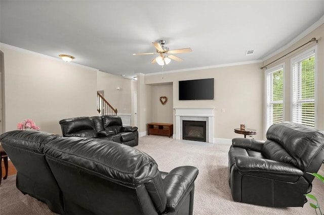 1709 Grove Ct SE, Conyers, GA 30013 - living area with carpet flooring, a ceiling fan, baseboards, ornamental molding, and stairway